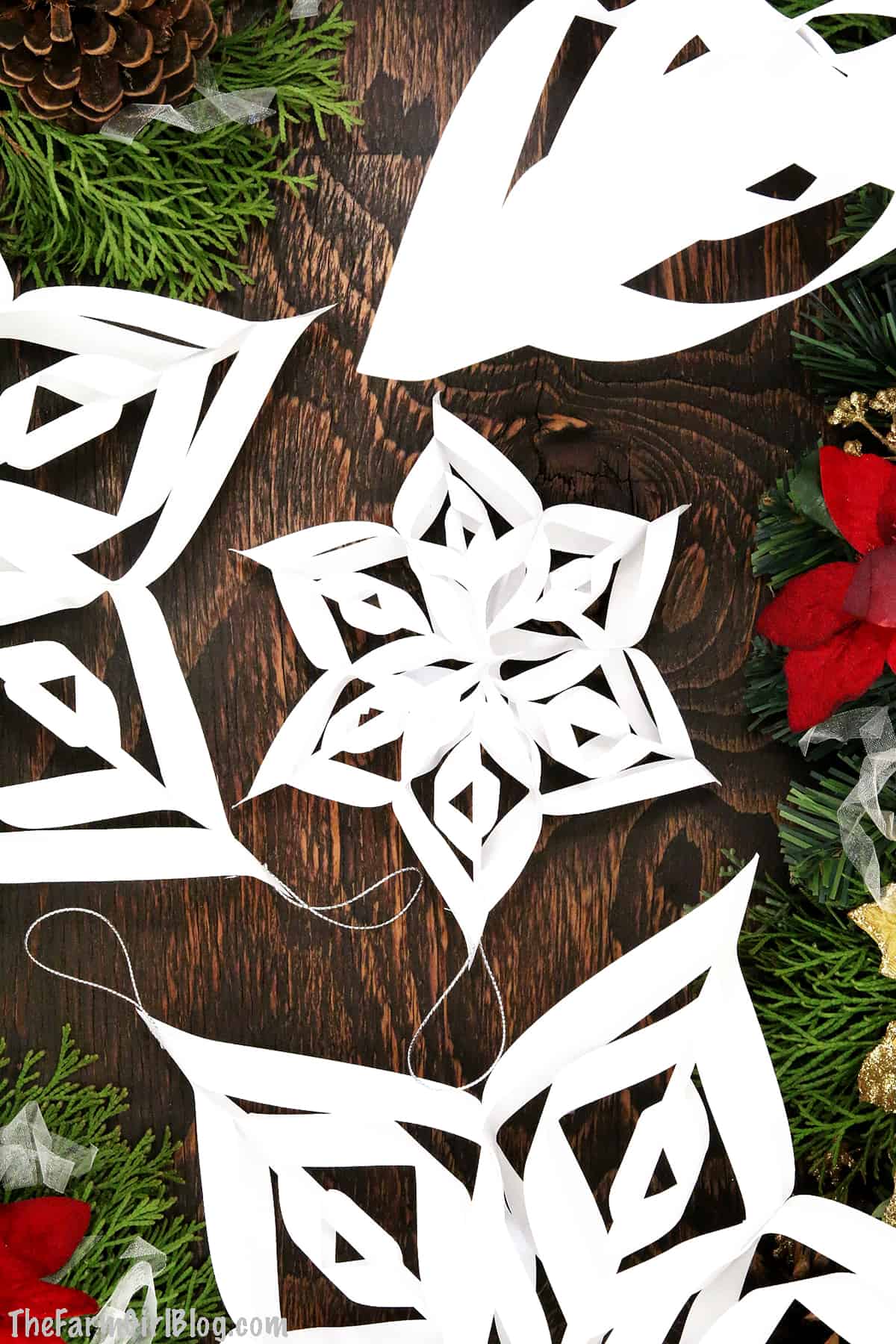 Kids' Christmas break is just around the corner and I have the perfect project for them to do alone or as a family. These Easy 3D Paper Snowflakes are so much fun to make not only for kids but adults enjoy them as well. 