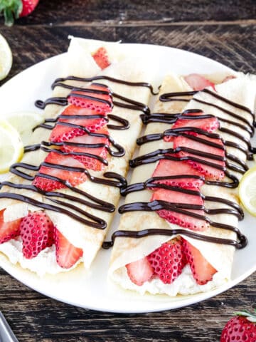 Crepes with Strawberries and Cream are fancy French treat that everyone raves about. It's so good!