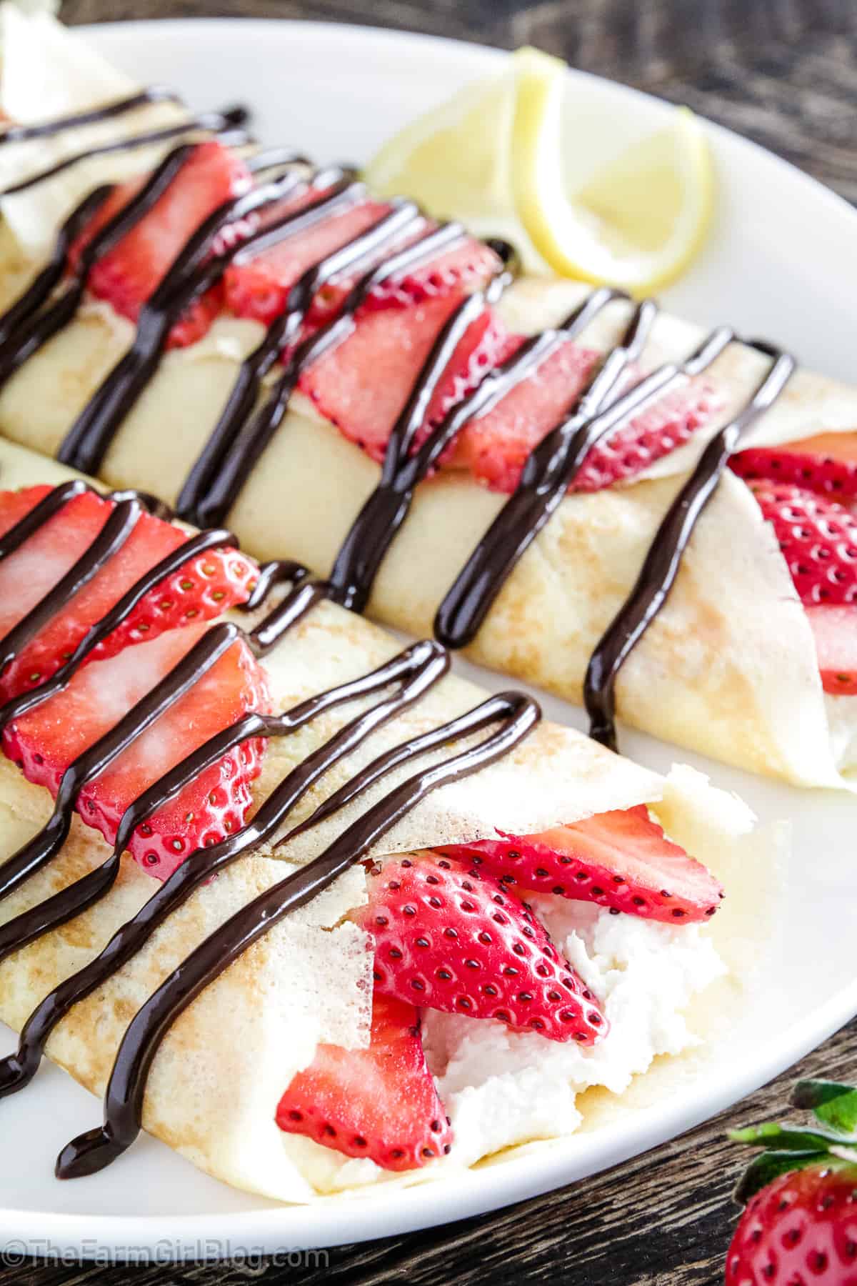 I love to enjoy these Crepes with Strawberries and Cream with a cup of coffee. 